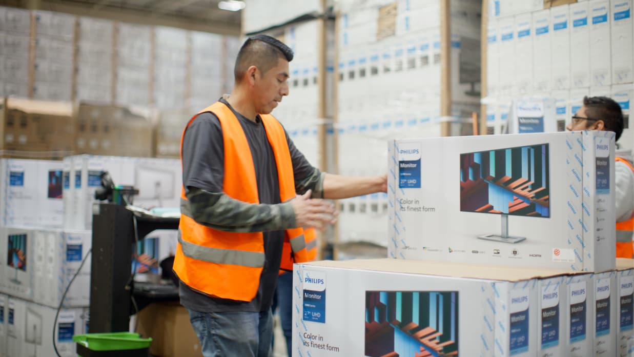 Worker looking at digital display