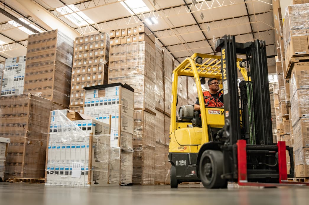 Forklift in warehouse